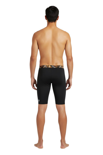 The Lifeguard Store RISE Sandies Helix Poly Jammer swimsuit with black body and abstract orange and white waistband. Made of 91% Polyester/9% Spandex.