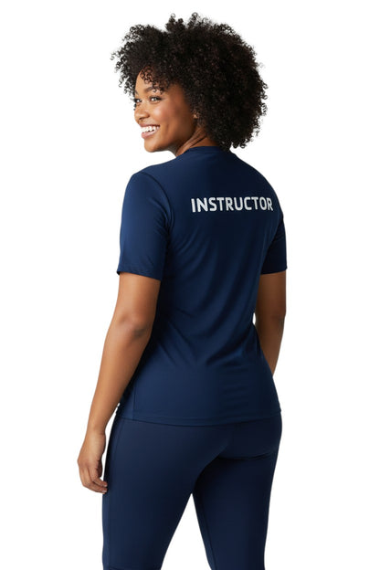 The Lifeguard Store YMCA Kiefer Instructor navy blue short-sleeve rashguard made of polyester and spandex with UPF50+ protection.