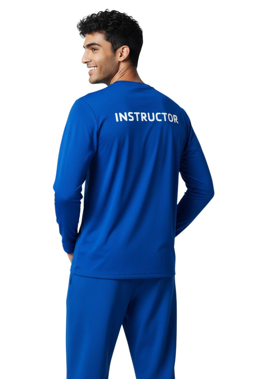 The Lifeguard Store YMCA Kiefer Instructor long sleeve rashguard in royal blue, made of polyester and spandex with UPF50+ protection.