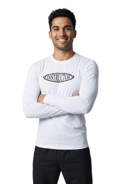 The Lifeguard Store white long sleeve crew neck rashguard with black "INSTRUCTOR" graphic on chest. UPF50+.