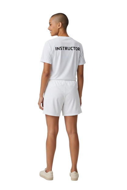 The Lifeguard Store white short sleeve rashguard with "INSTRUCTOR" printed on the back. Made of 91% polyester and 9% spandex.