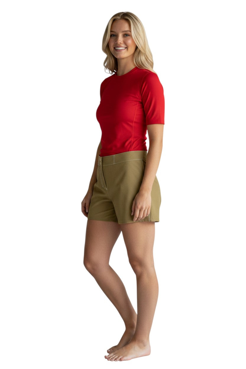 The Lifeguard Store RISE Solid Female Flex Short in khaki, polyester-spandex blend with white contrast stitching and 5" inseam.
