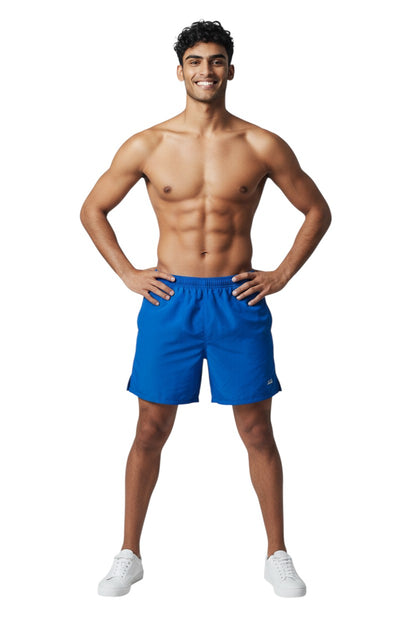 The Lifeguard Store Kiefer 4-Way Unisex Deck Short in solid blue. Features elastic waist, drawstring, side pockets, and a back pocket.