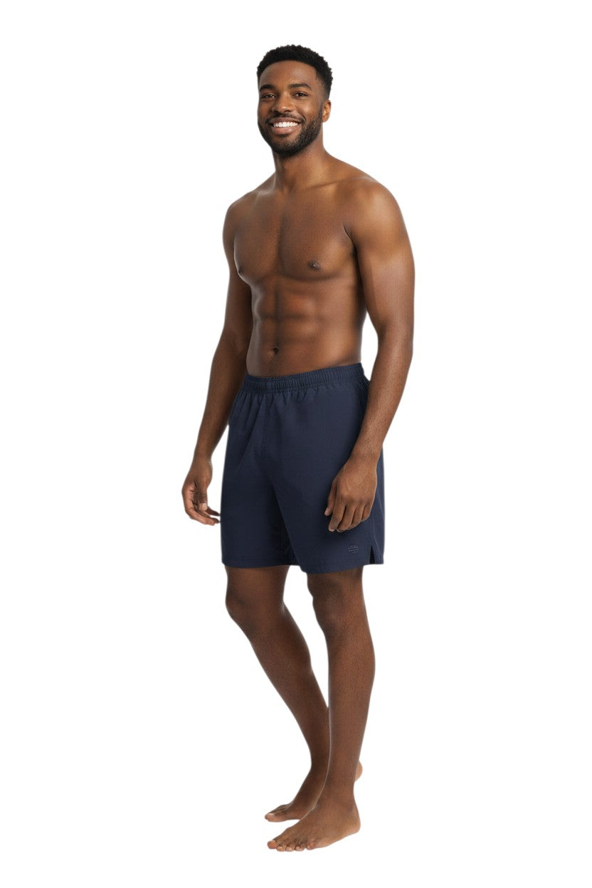 The Lifeguard Store Kiefer 4-Way Unisex Deck Short in solid navy blue with elastic waist, drawstring, side pockets, and back velcro pocket.