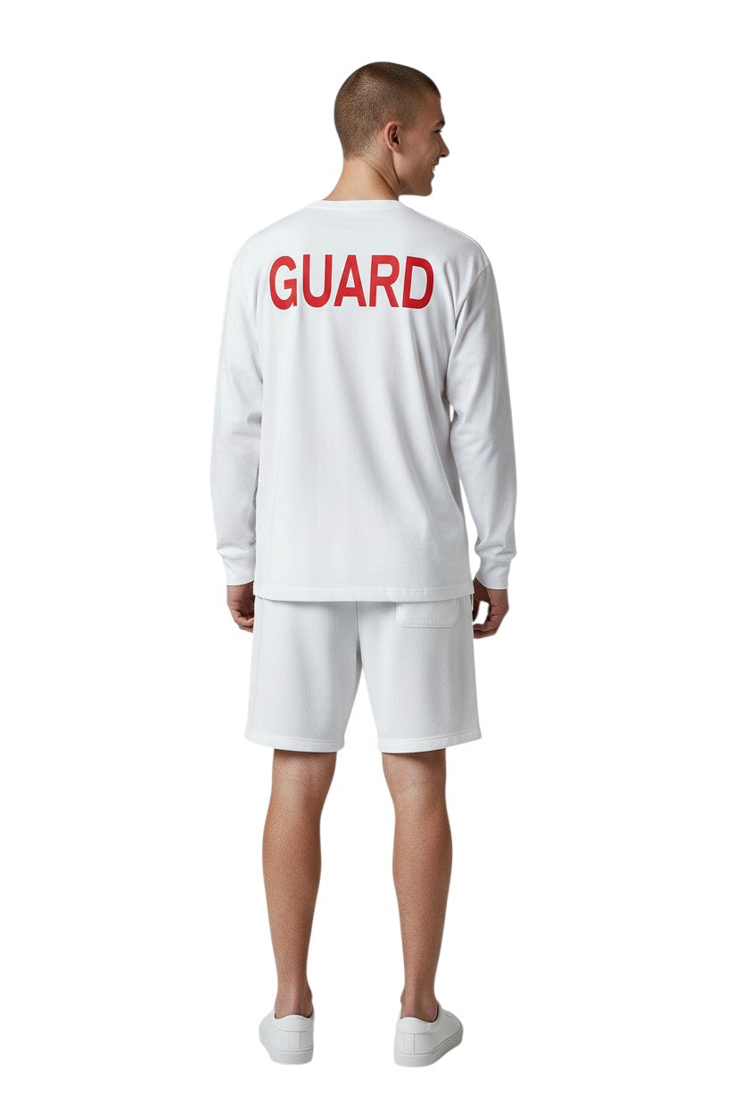 The Lifeguard Store Kiefer Long Sleeve Guard Tee in white 100% cotton jersey with red "GUARD" text on back.