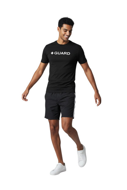 The Lifeguard Store Kiefer Guard short sleeve black rashguard with white + GUARD text on chest. UPF50+.