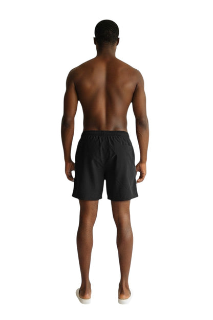 The Lifeguard Store Kiefer Men's black polyester board shorts with liner, elastic waistband, drawstring, and cargo pocket.