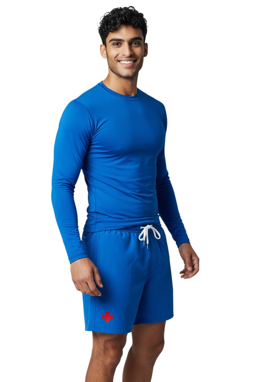 The Lifeguard Store Kiefer Solid Long Sleeve Crewneck Rashguard in royal blue, made of polyester and spandex with UPF50+ protection.