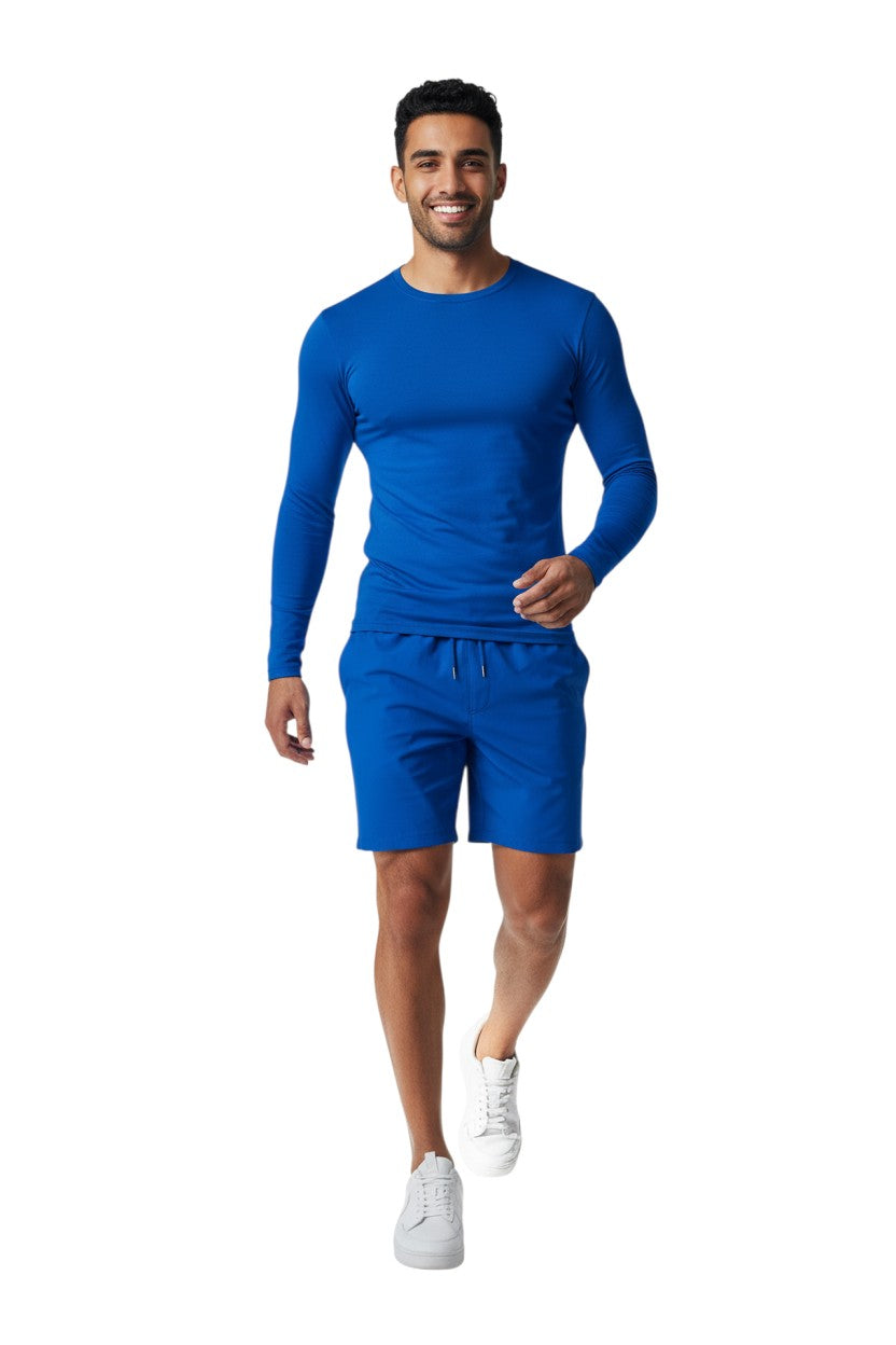 The Lifeguard Store Kiefer Solid Long Sleeve Crewneck Rashguard in royal blue, made of polyester and spandex blend with UPF50+ UV protection.