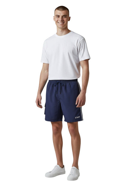 The Lifeguard Store Kiefer Staff Board Short with Liner in navy blue. Features white side stripes and "STAFF" text.