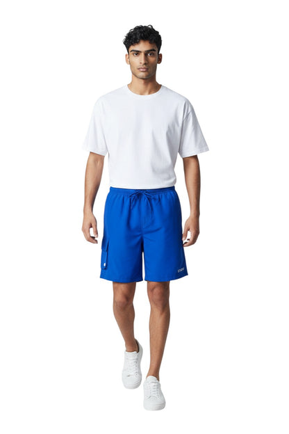 The Lifeguard Store Kiefer Staff Board Short with Liner in royal blue polyester. Features elastic waistband, drawstring, cargo pocket, and "STAFF" logo.