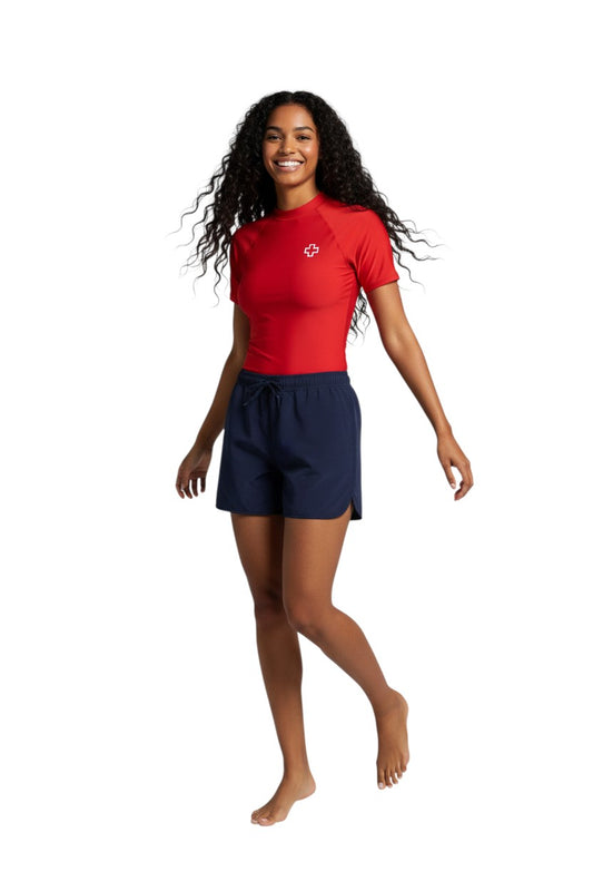 The Lifeguard Store Kiefer Women’s 5” navy blue quick-dry stretch shorts with drawstring and side pockets.
