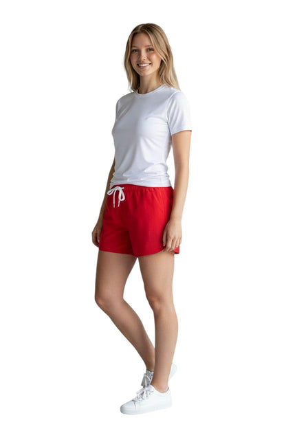 The Lifeguard Store Kiefer Women’s red 5” shorts with drawstring waist and lifeguard logo.