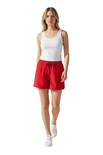 The Lifeguard Store Kiefer Women's 5" red quick-dry swim shorts with elastic waistband and drawstring. UPF50+.