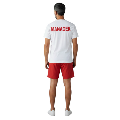 The Lifeguard Store white cotton Manager tee with red lettering on the back, worn by a man with red shorts.