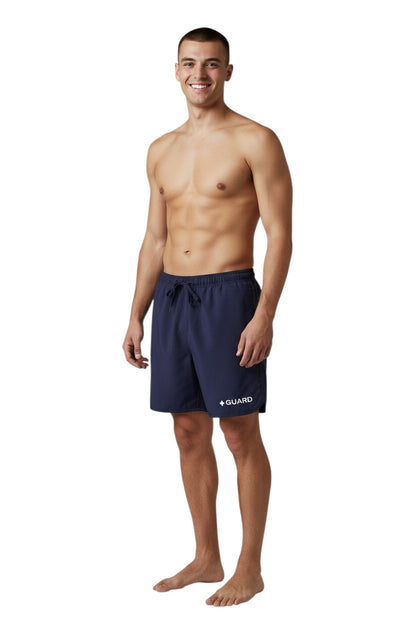 The Lifeguard Store Men's navy blue Guard 5" shorts with elastic waistband, drawstring, and side pockets. Quick-dry fabric.