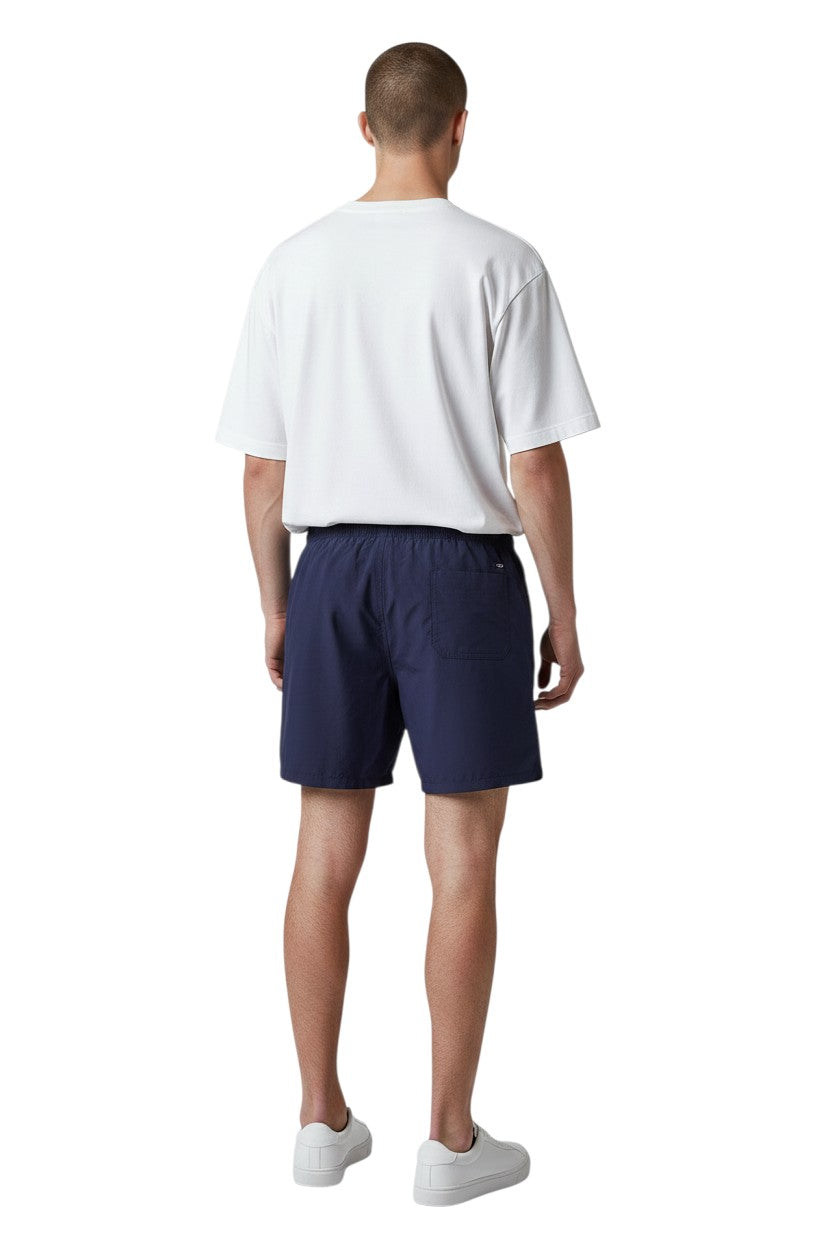 The Lifeguard Store Men's navy blue Guard 5" shorts with elastic waistband, drawstring, and side pockets. Features UPF50+ protection.