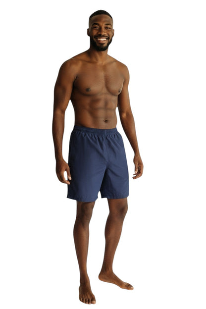 The Lifeguard Store navy blue polyester board shorts with elastic waistband and drawstring. Features quick-dry fabric and UPF30+ protection.