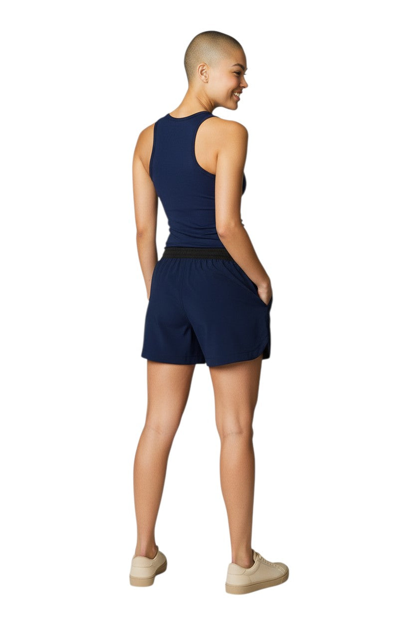 The Lifeguard Store navy blue polyester comfy shorts with elastic waistband, drawstring, and pockets. UPF30+ UV protection.