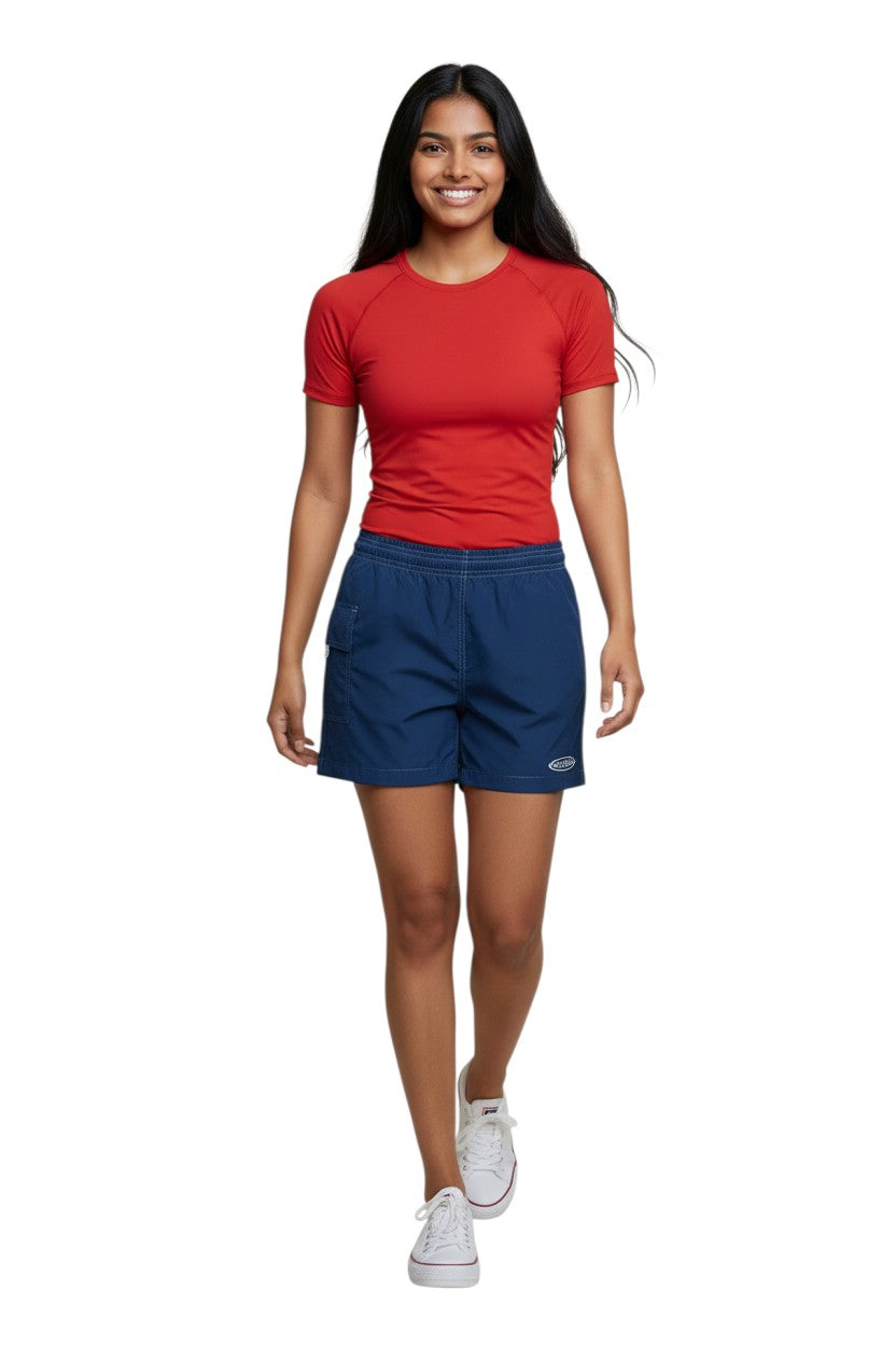 The Lifeguard Store navy blue polyester-spandex board shorts with drawstring waist and side pocket. Features GUARD logo.