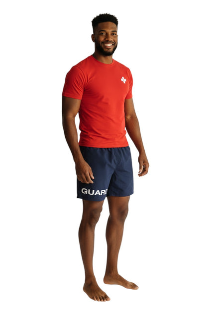 The Lifeguard Store navy blue 4-way stretch polyester lifeguard deck shorts with white GUARD text.