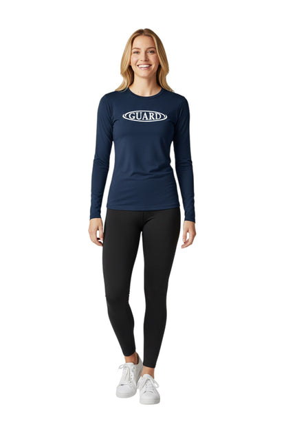The Lifeguard Store navy blue long sleeve rashguard with white GUARD logo on chest. Made of poly-spandex blend with UPF50+ protection.