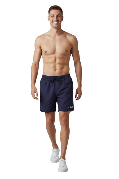The Lifeguard Store navy blue men's 5" Guard shorts with elastic waistband, drawstring, and side pockets. Quick-dry fabric.