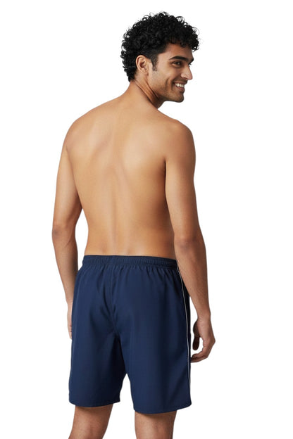 The Lifeguard Store navy blue nylon Guard trunks with white piping and logo on left leg. Elastic waistband with drawstring.