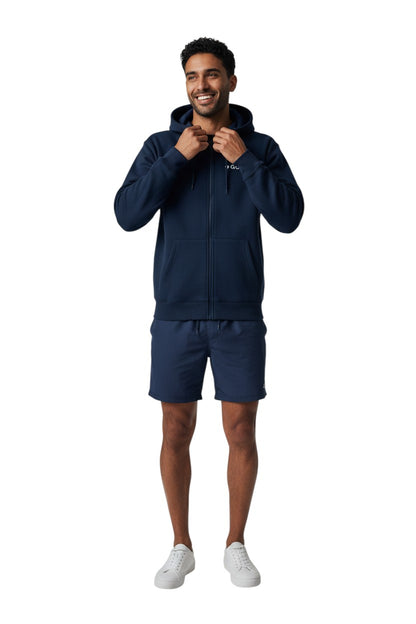 The Lifeguard Store navy blue cotton-polyester blend zip-up hoodie with "GUARD" logo on chest. Features a double-lined hood and front pockets.