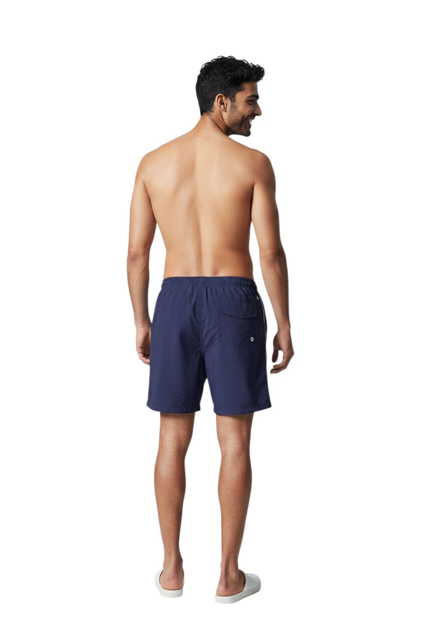 The Lifeguard Store navy blue polyester instructor board shorts with elastic waistband, drawstring, and cargo pocket.