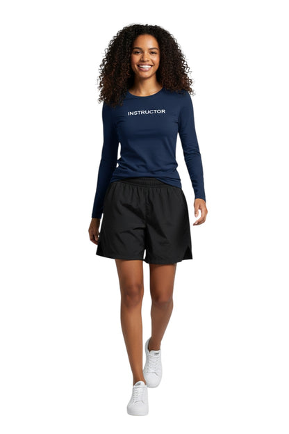 The Lifeguard Store navy blue long sleeve rashguard with "INSTRUCTOR" printed in white on the chest. Made of poly stretch fabric.