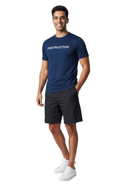 The Lifeguard Store navy blue short sleeve rashguard with "INSTRUCTOR" printed on the chest. Made of polyester and spandex.
