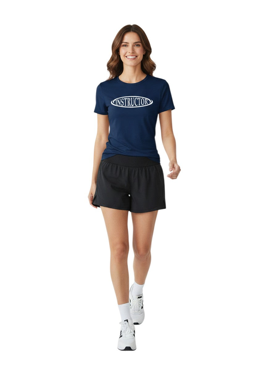 The Lifeguard Store navy blue short sleeve rashguard with white "INSTRUCTOR" text on chest. Made of poly-spandex blend.