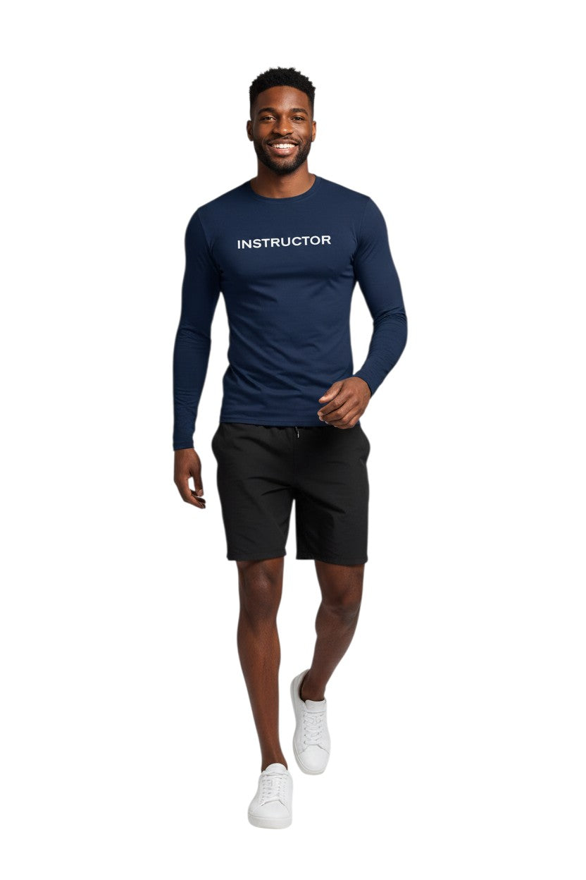 The Lifeguard Store navy blue long sleeve rashguard with "INSTRUCTOR" printed in white on the chest. Made of poly-spandex blend for comfort and UPF 50+ sun protection.