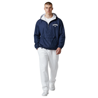 Male model wearing The Lifeguard Store navy blue nylon pullover jacket with white sweatshirt lining and Guard logo.