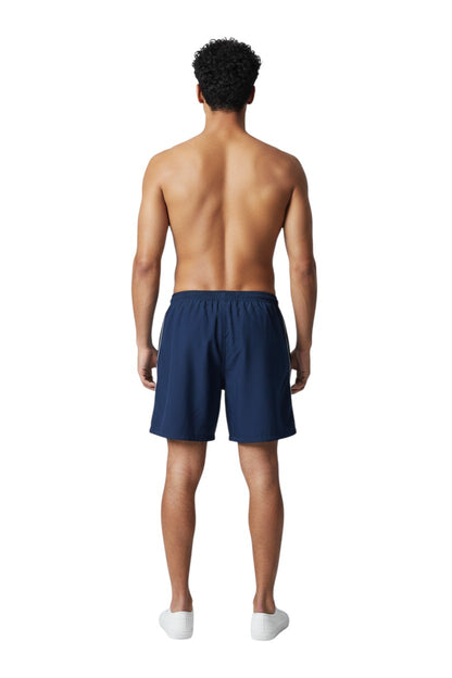 The Lifeguard Store navy blue nylon trunks with white side piping and elastic waistband.
