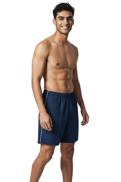 The Lifeguard Store navy blue nylon trunks with white side piping and elastic waistband.