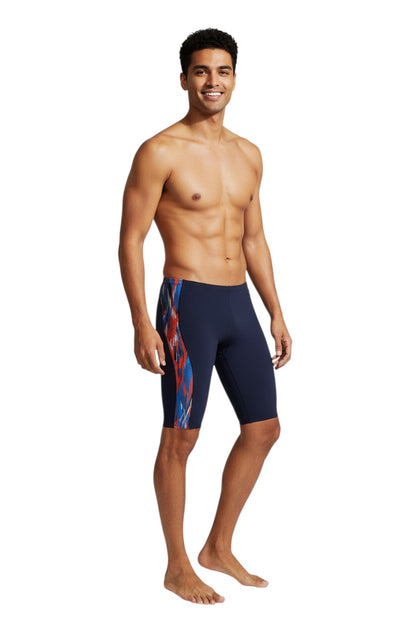 The Lifeguard Store RISE Sandies Shockwave Poly Jammer swimsuit in navy with a colorful abstract side panel. Made of polyester and spandex.