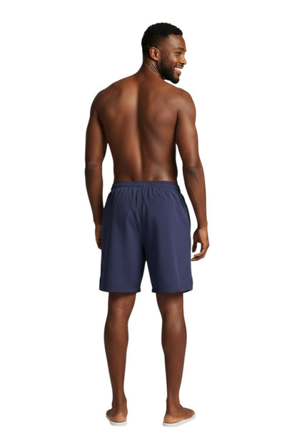 The Lifeguard Store navy blue polyester board shorts with elastic waistband and 7" inseam.
