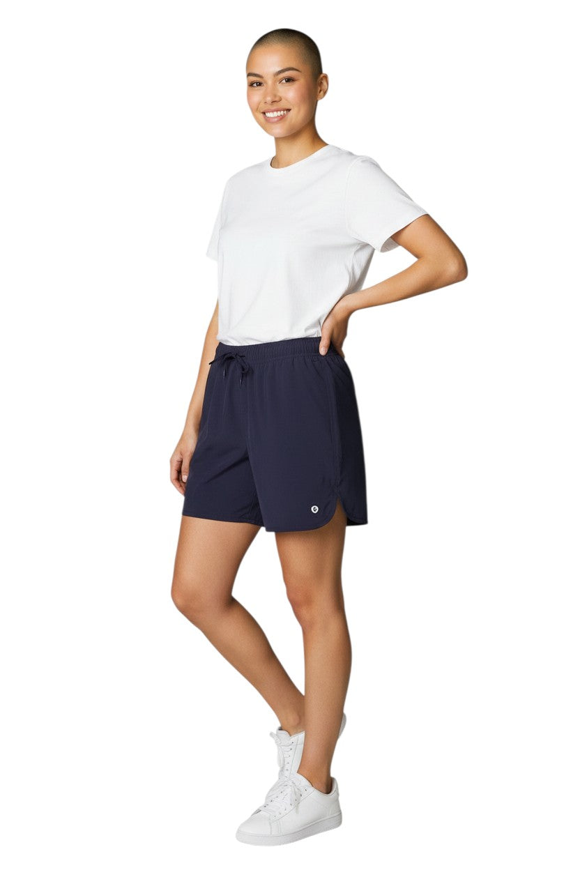 The Lifeguard Store navy blue polyester 5" inseam shorts with elastic waistband and drawstring. Quick-dry fabric.