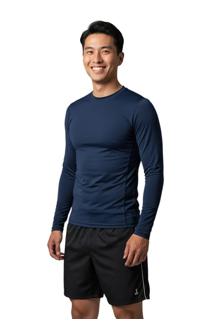 The Lifeguard Store RISE Solid Long Sleeve Crew Neck Rashguard in navy blue, made of polyester and spandex with UPF50+ protection.