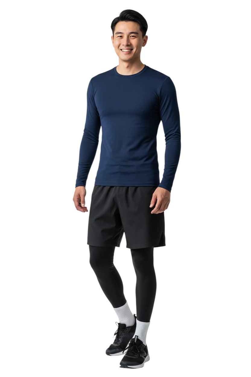 The Lifeguard Store RISE Solid Long Sleeve Crew Neck Rashguard in navy blue, made of 91% polyester and 9% spandex with UPF50+ UV protection.