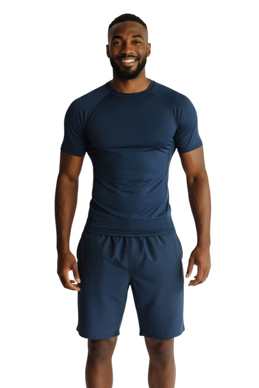 The Lifeguard Store navy blue short sleeve crewneck rashguard made of poly stretch fabric with UPF50+ protection.