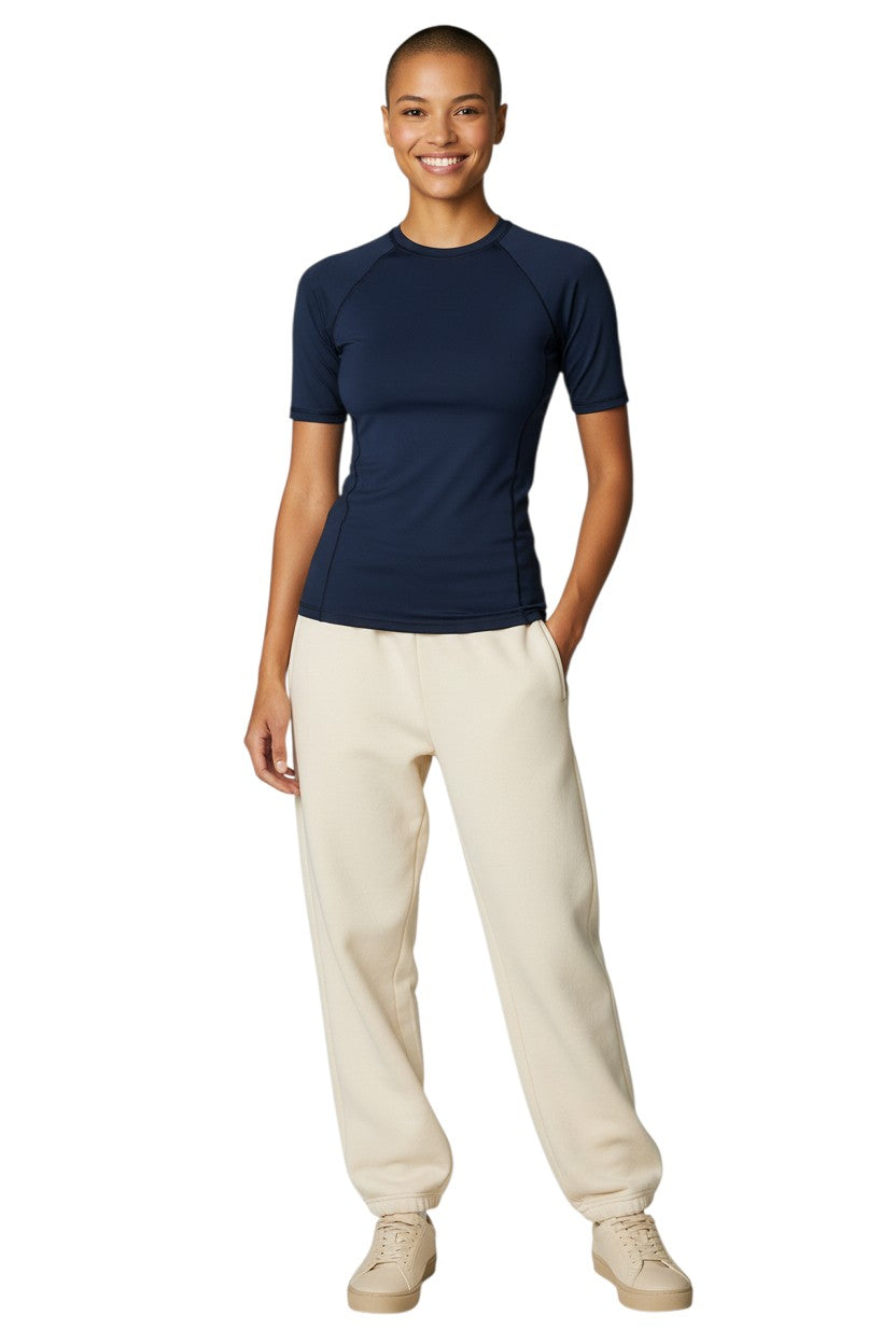 The Lifeguard Store navy blue short sleeve crewneck rashguard made of poly stretch fabric with UPF50+ protection.