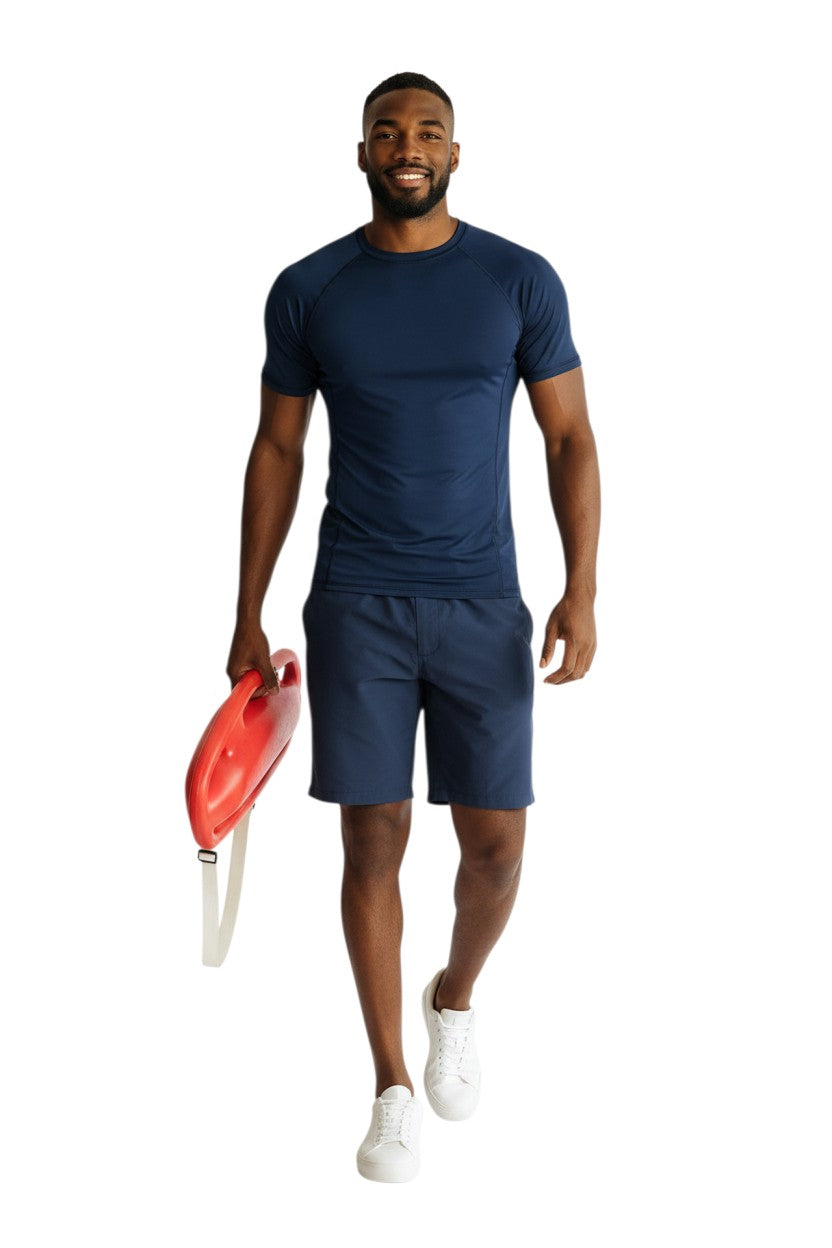 The Lifeguard Store navy blue short sleeve crewneck rashguard made of poly stretch fabric with UPF50+ protection.
