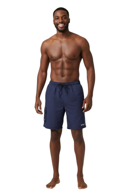 The Lifeguard Store navy blue polyester staff board shorts with elastic waistband, drawstring, and cargo pocket.