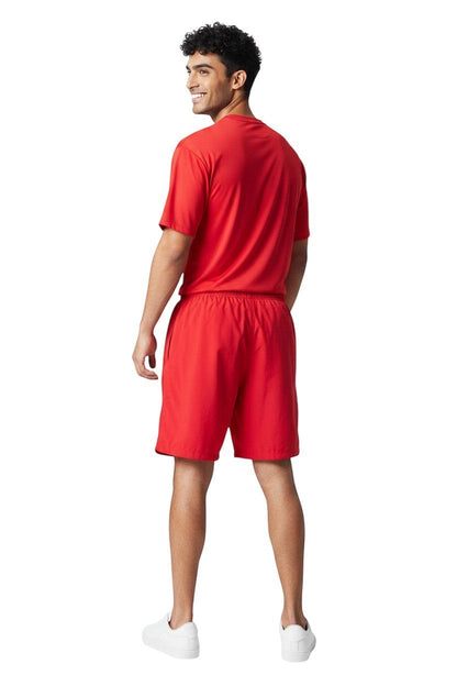 The Lifeguard Store red polyester-spandex board shorts with elastic waistband and 7" inseam.