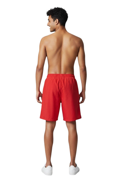 The Lifeguard Store red polyester board shorts with elastic waistband and drawstring. Features quick-dry fabric and UPF30+ protection.