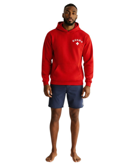 The Lifeguard Store red hooded sweatshirt with white GUARD logo, worn by a male model with navy blue shorts.