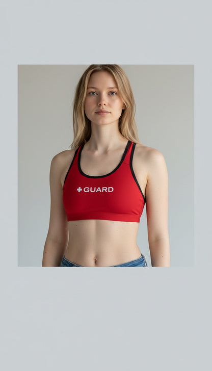The Lifeguard Store red racer back top with white "GUARD" text and black trim. Made of poly stretch fabric.